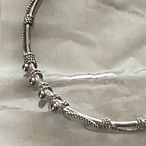 2/$20 Vintage, Silver tone, Tribal Wire Wrap decorative bangle bracelet. - Picture 10 of 11
